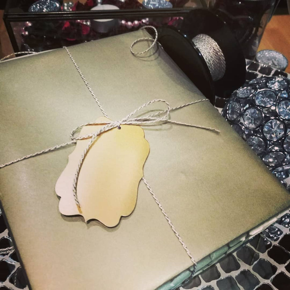 Gift box wrapped in Kraft Gold Gift Wrap