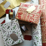 Two Gift Boxes wrapped in Stocking Green & Merry Red Gift Wrap