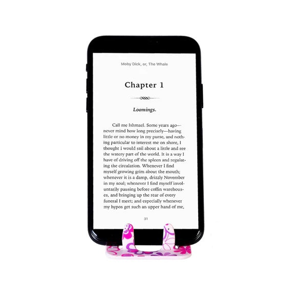 Thinking Gifts Flexistand Phone Stand | Pink Flowers | In Use Portrait | Unique Gift Ideas for Her | for Mom | for Women | for Females | for Wife | for Sister | for Girlfriend | for Grandma | for Friends | for Birthday | Gifting Made Simple | Unique Gift Ideas for Him | for Dad | for Men | for Males | for Husband | for Brother | for Boyfriend | for Grandad